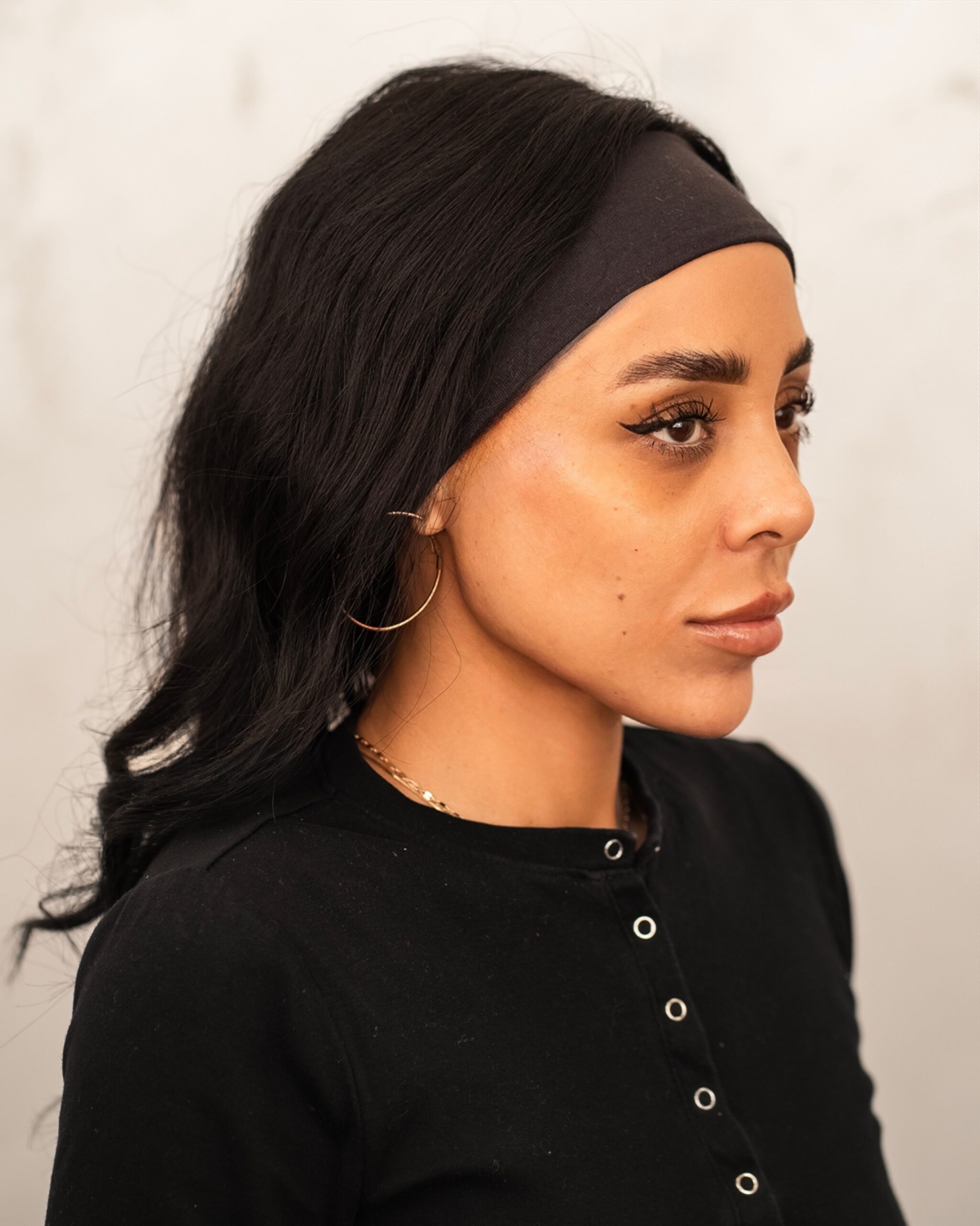 Side-angle portrait in the clinic.